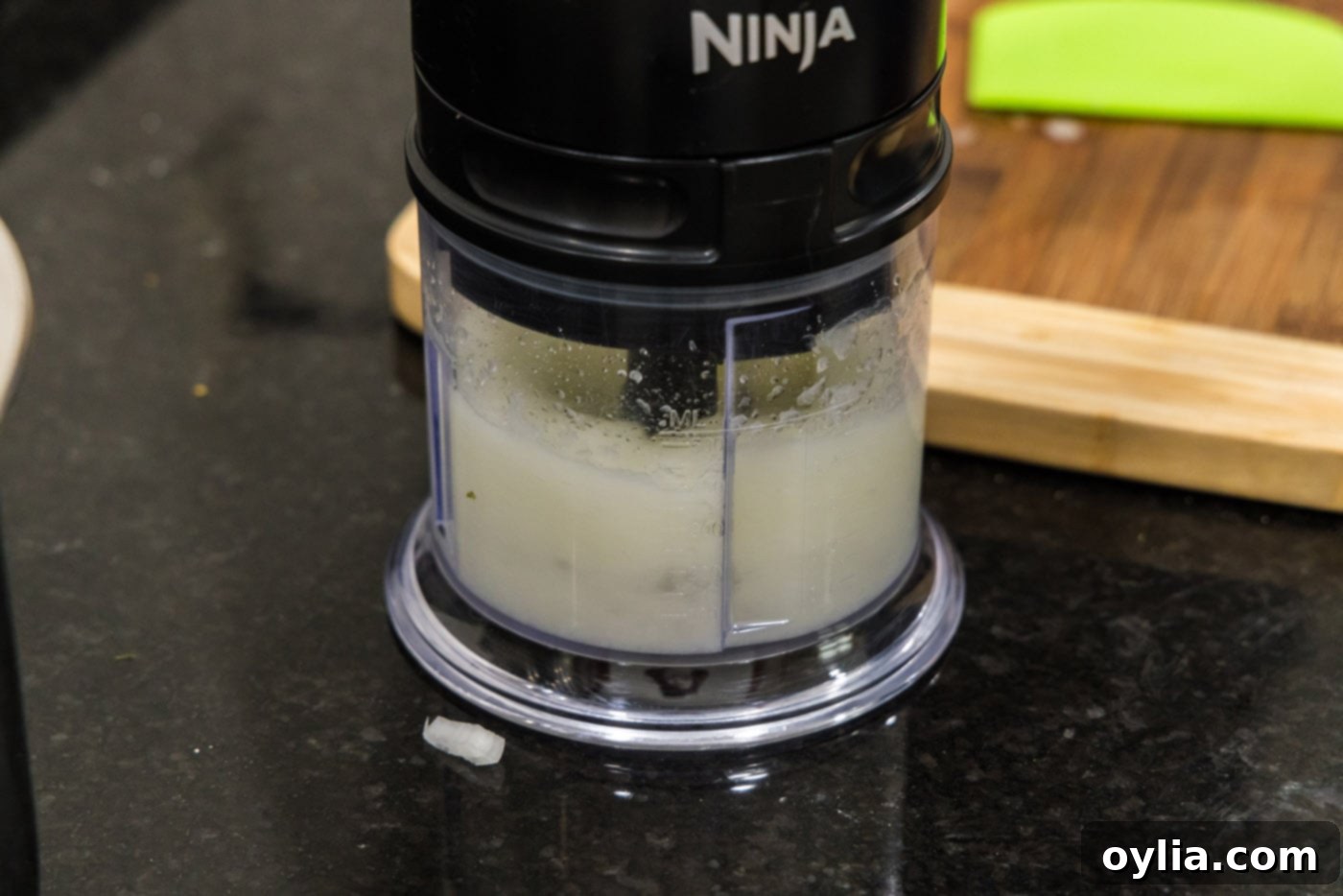 Finely minced onion after being blitzed in a food processor.