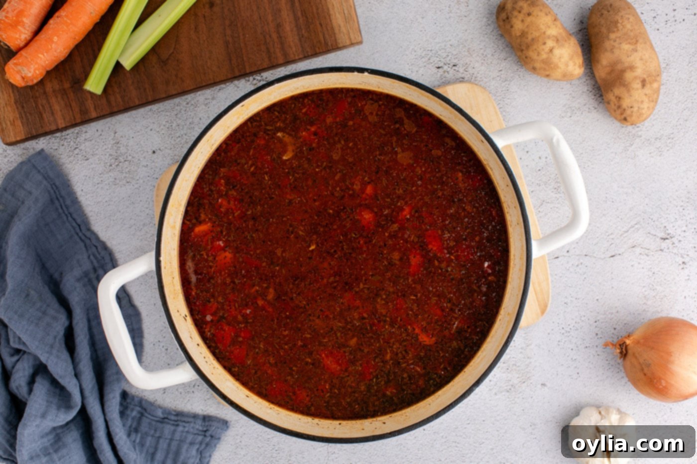 vegetable beef soup in a dutch oven