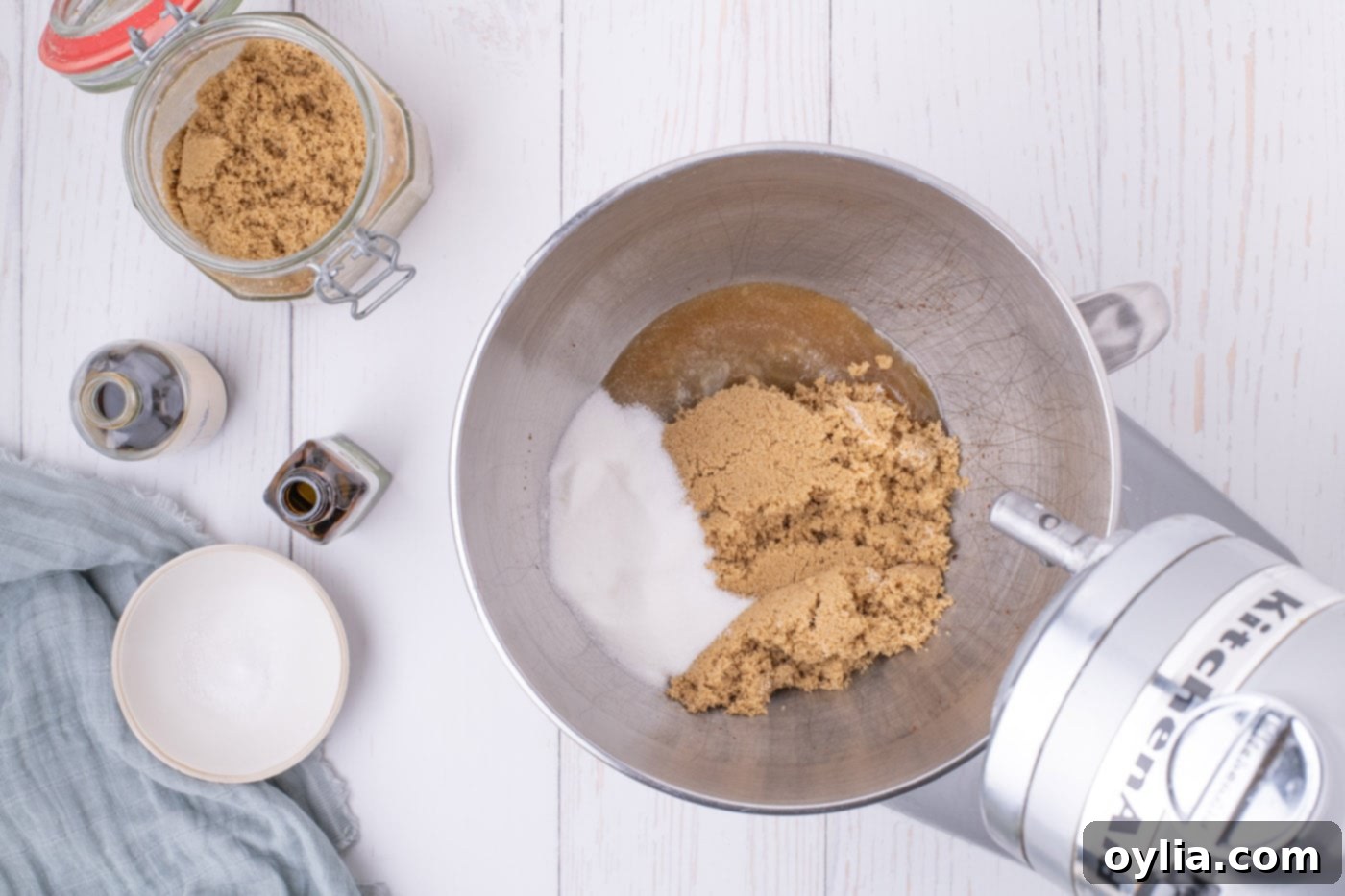 brown sugar, granulated sugar, and browned butter in a mixing bowl