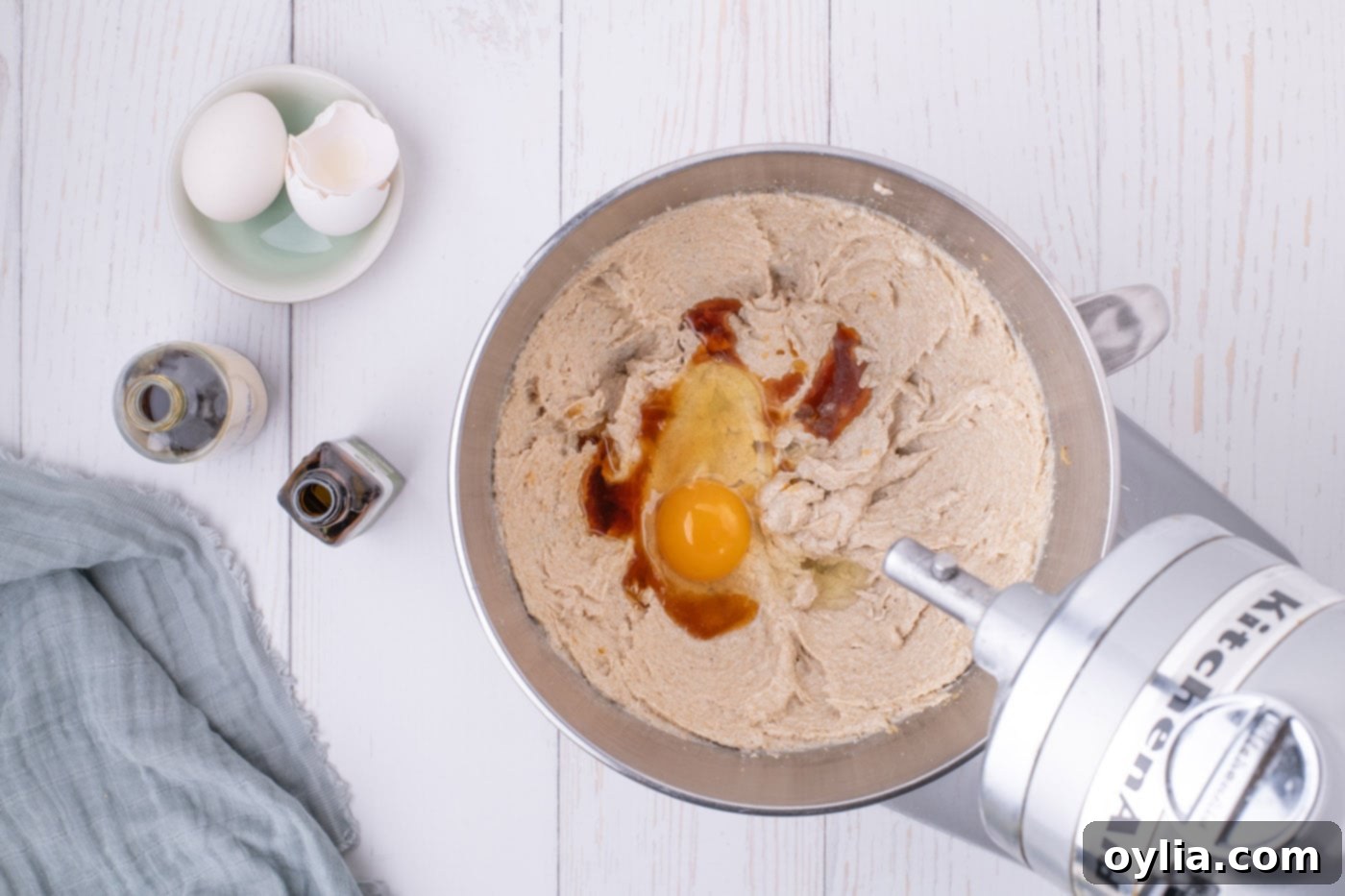 adding eggs to browned butter blondie batter