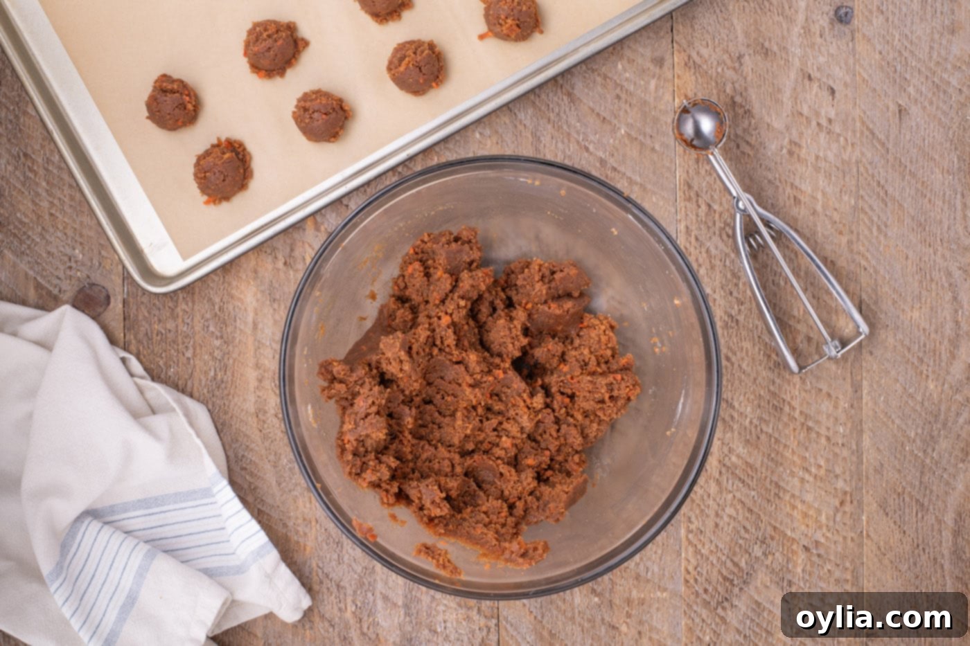 carrot cake and cream cheese frosting mixture in a bowl