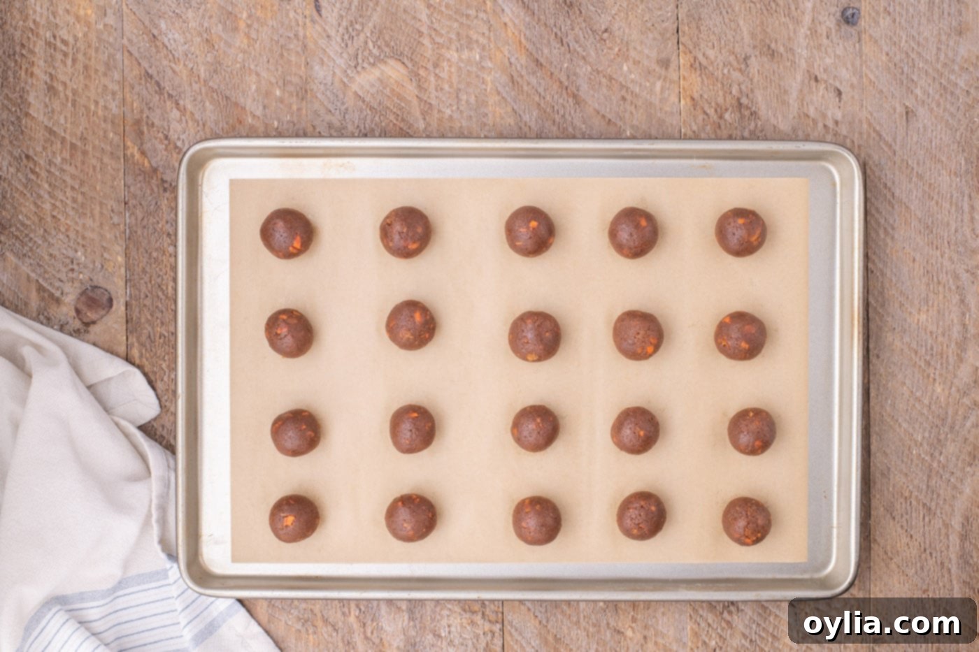 carrot cake balls on a baking sheet