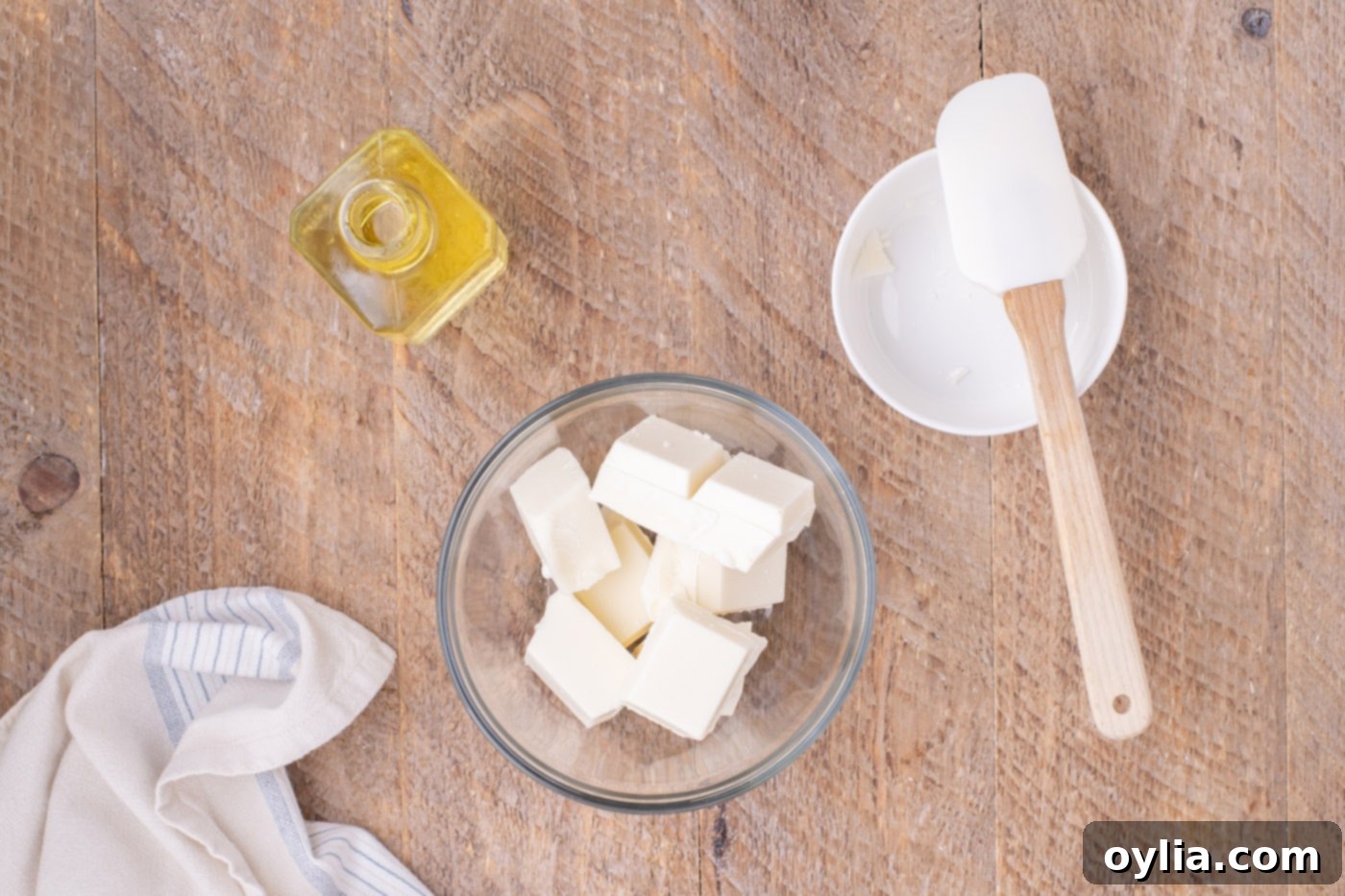 white almond bark squares in a bowl