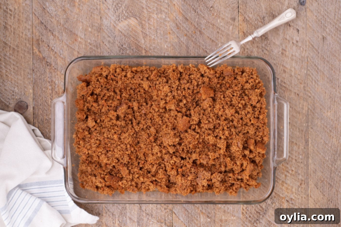 crumbled carrot cake in a pan