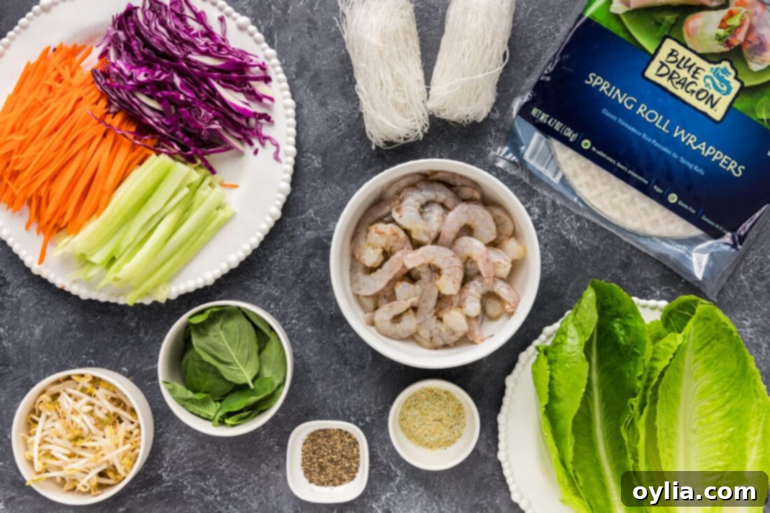 A vibrant selection of ingredients laid out for preparing fresh Shrimp Spring Rolls