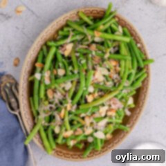 Almond-Kissed Green Beans 14 Close up photo of Green Beans Almondine in a serving platter