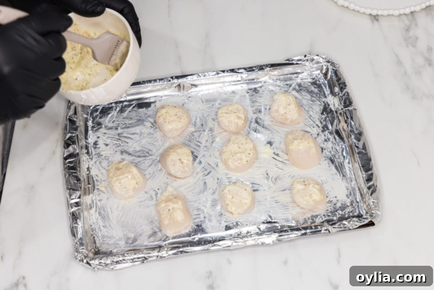 brushing scallops with softened butter mixture