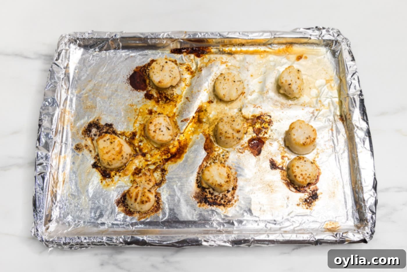 easy broiled scallops on a baking sheet