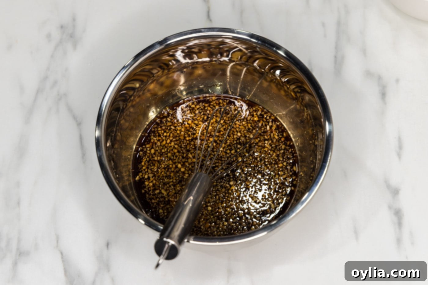soy sauce, white wine vinegar, garlic, brown sugar, honey, and garlic salt whisked in a bowl