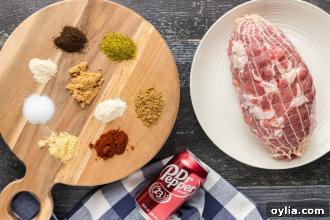 Ingredients laid out for making Pulled Pork Sliders, including pork, buns, and sauces