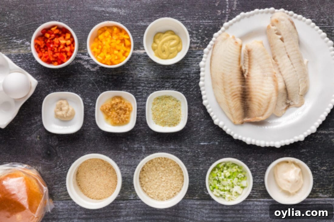 All the fresh ingredients laid out for making the Fish Burger recipe.