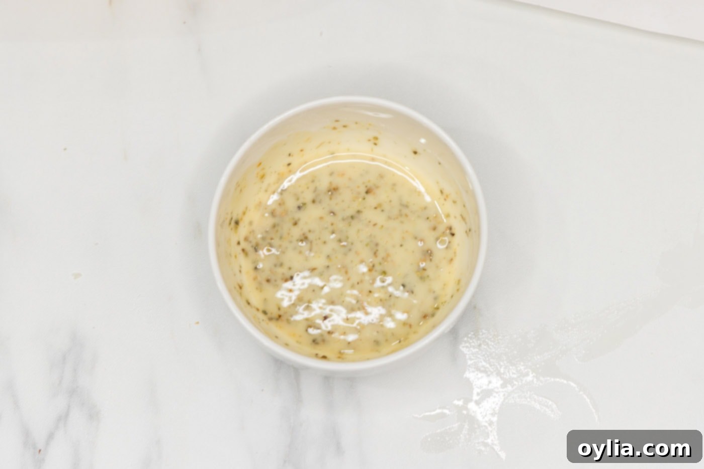 melted butter and seasoning mixture in a bowl