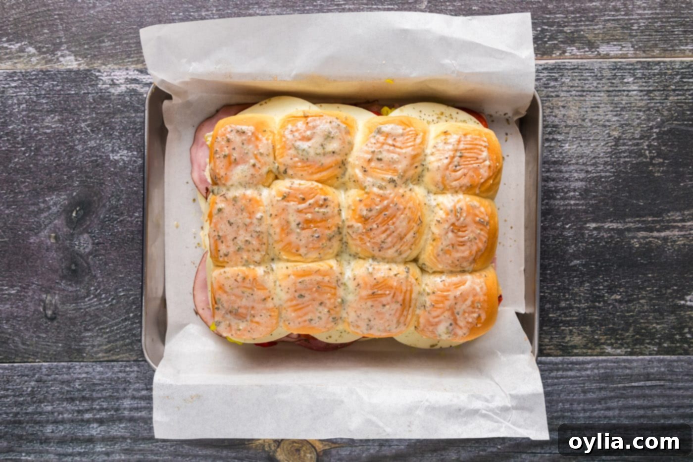 hot italian sliders brushed with melted butter