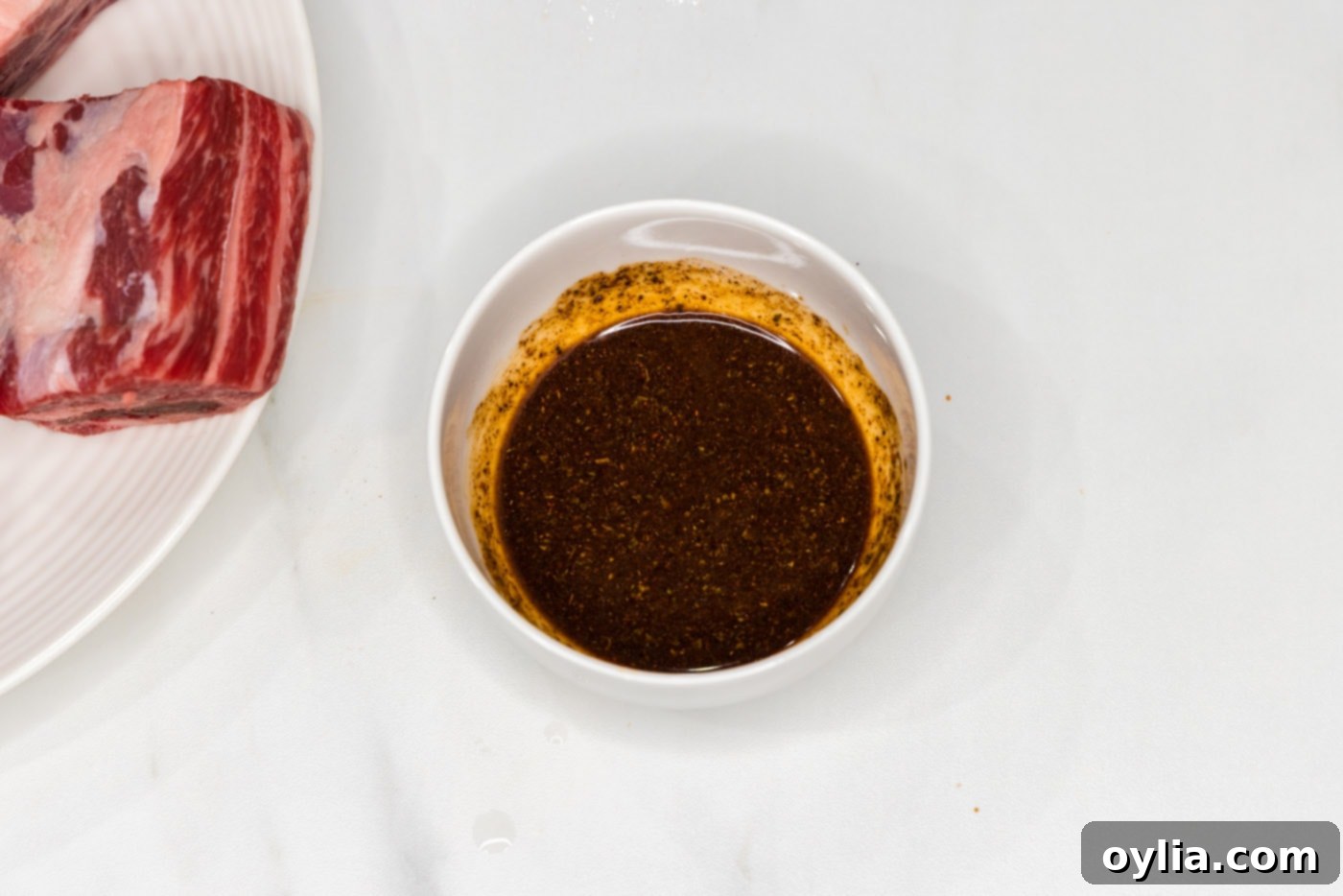 Olive oil and Mexican seasoning in a bowl