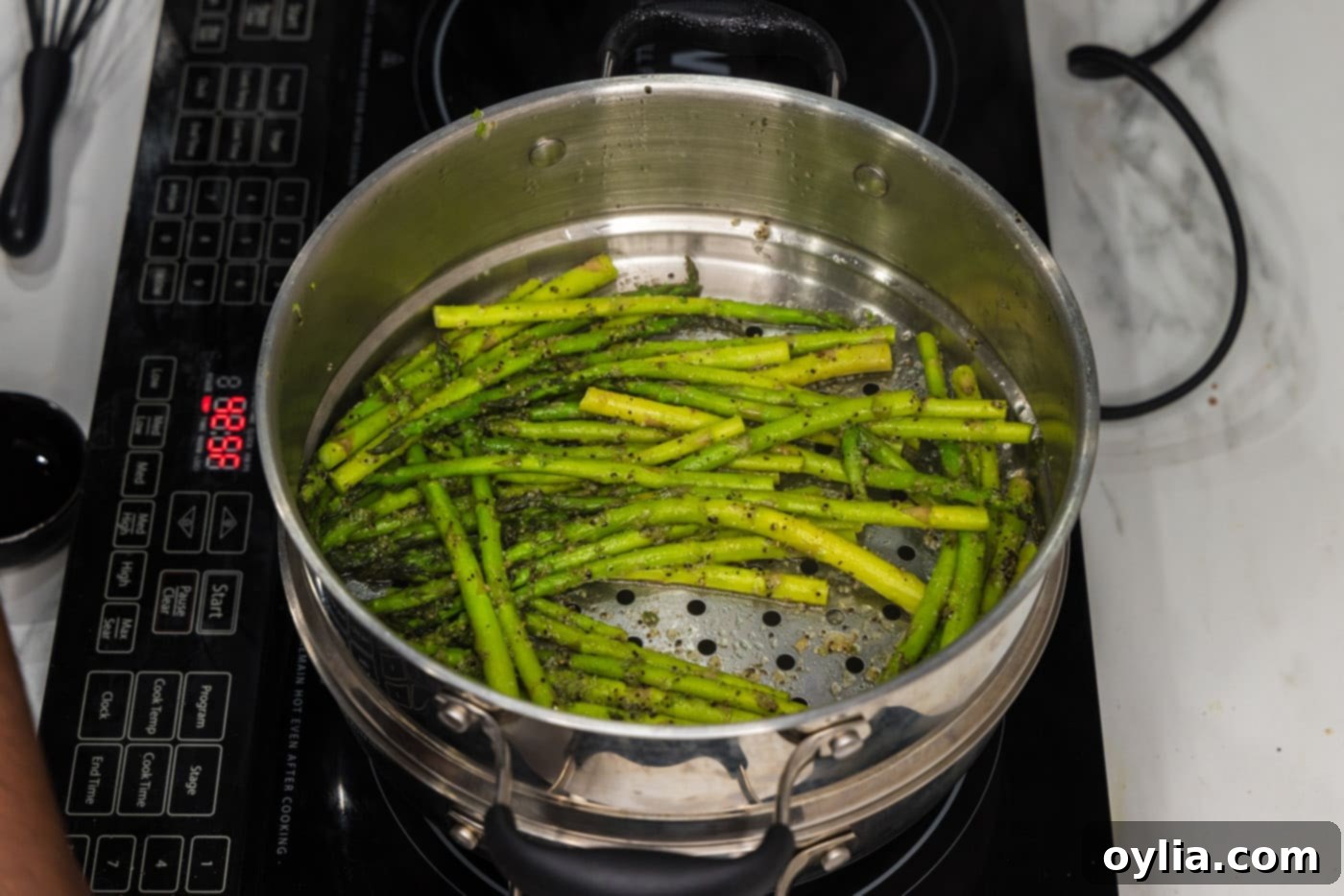 steamed asparagus in a pot