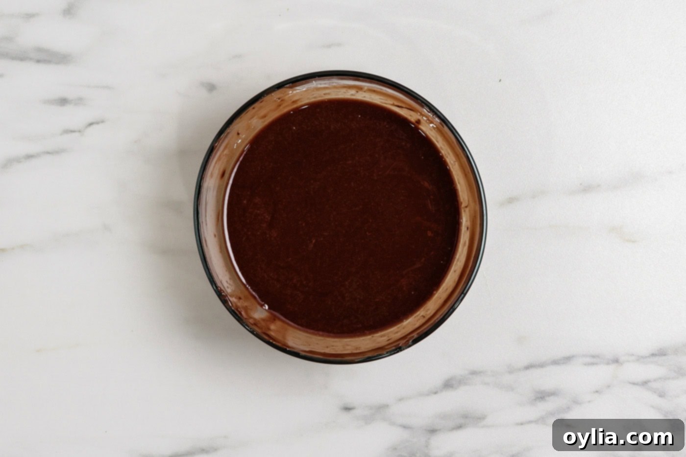 Spiced Pumpkin Swirl Cheesecake Brownies 7 Smooth, melted chocolate and butter mixture for the brownie batter