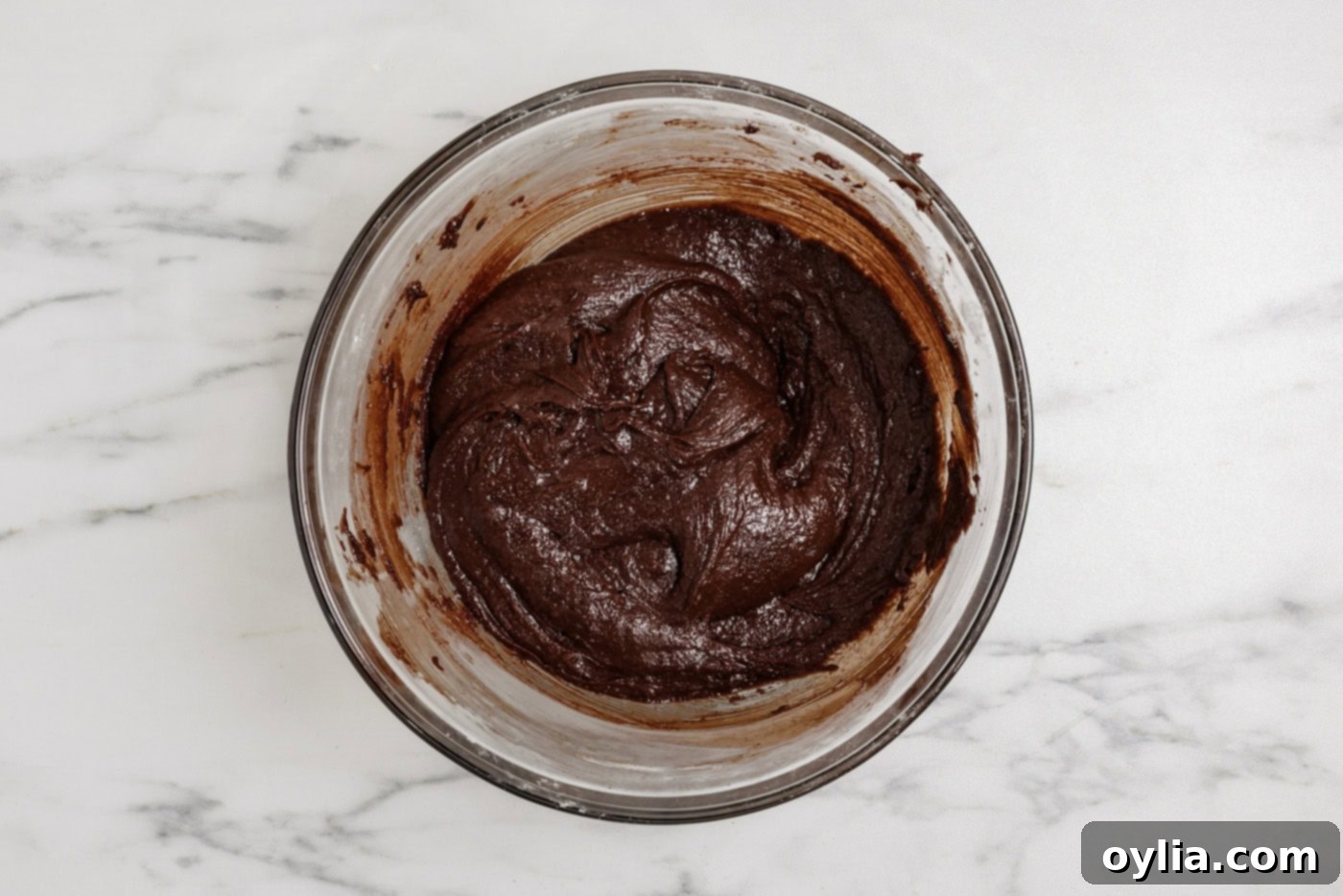 Spiced Pumpkin Swirl Cheesecake Brownies 9 Fudgy brownie batter in a mixing bowl, perfectly mixed
