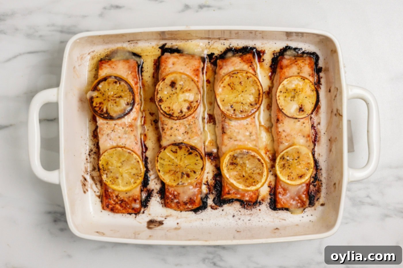Zesty Baked Salmon 9 overhead shot of baked lemon salmon in a baking sheet
