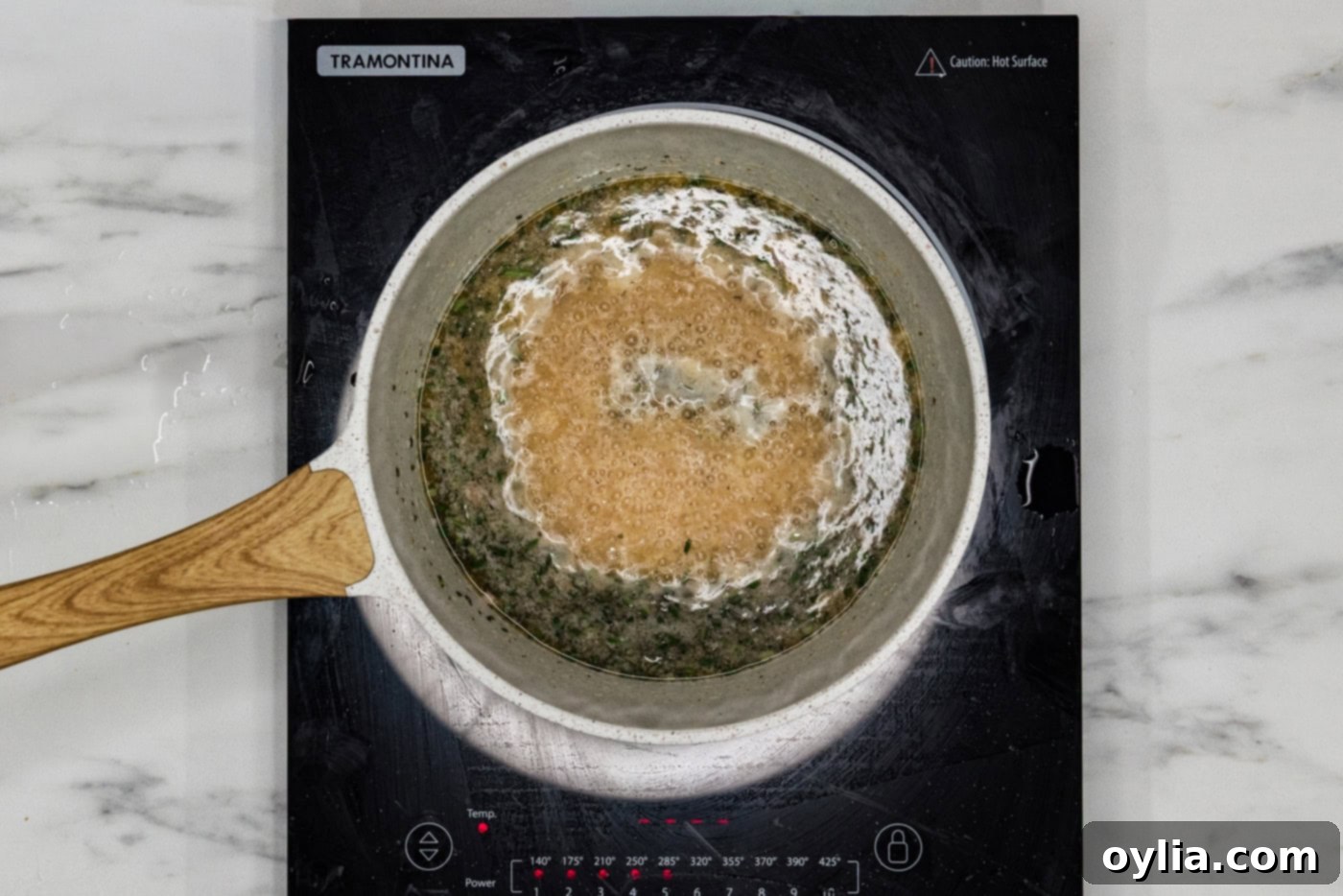 chilean sea bass sauce in a pot