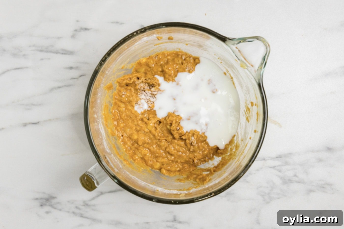 buttermilk added to pumpkin banana batter for enhanced moisture