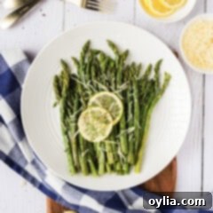 Tender-Crisp Instant Pot Asparagus 10 Plate of Instant Pot Asparagus with lemon slices
