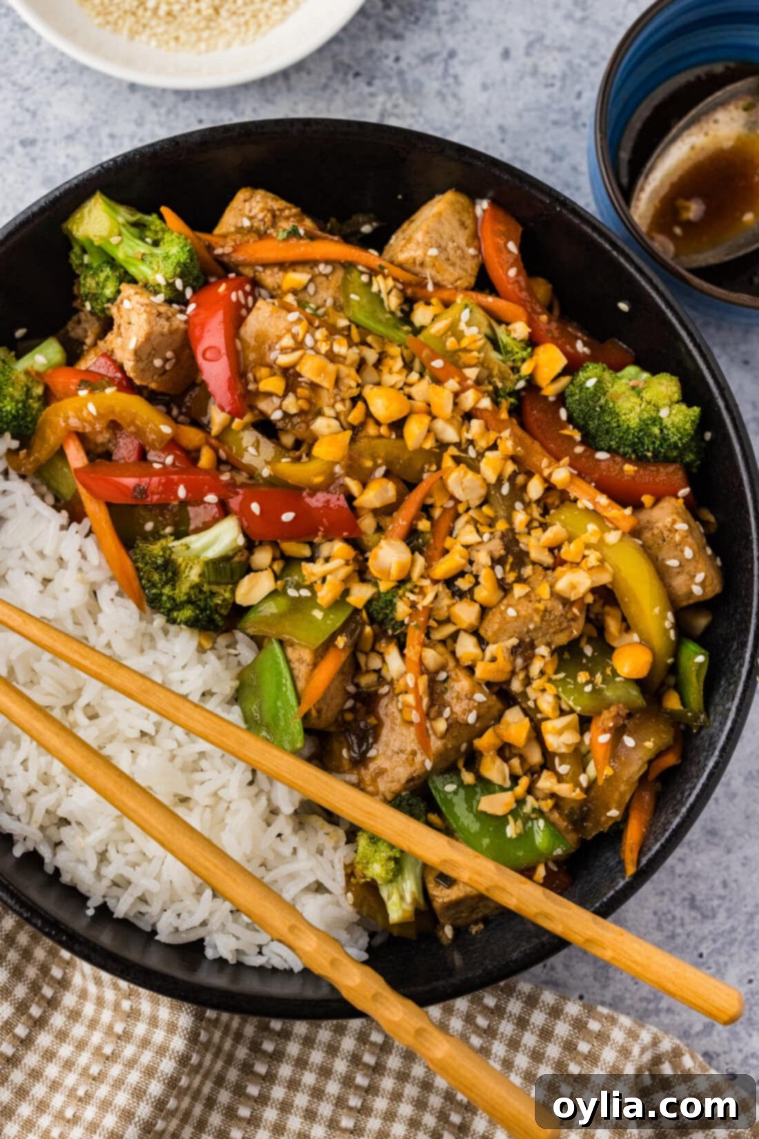 Close up photo of a bowl of Tofu Stir Fry with white rice