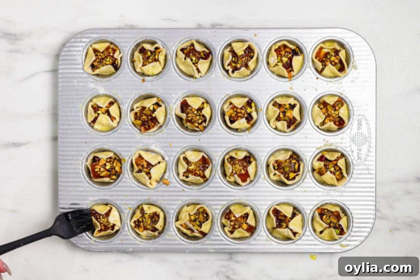 overhead of brie bites before being baked