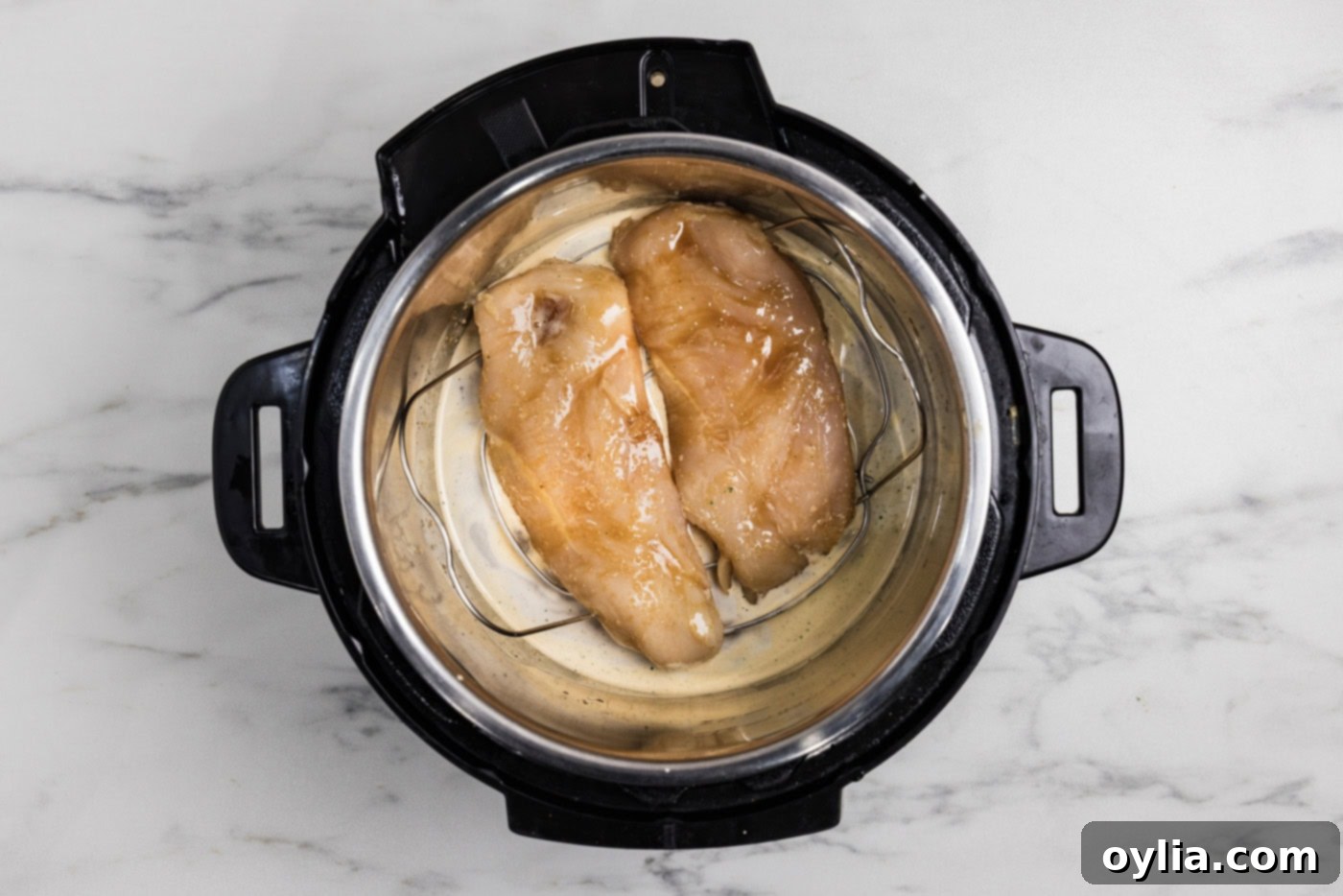 Chicken breasts in a pressure cooker