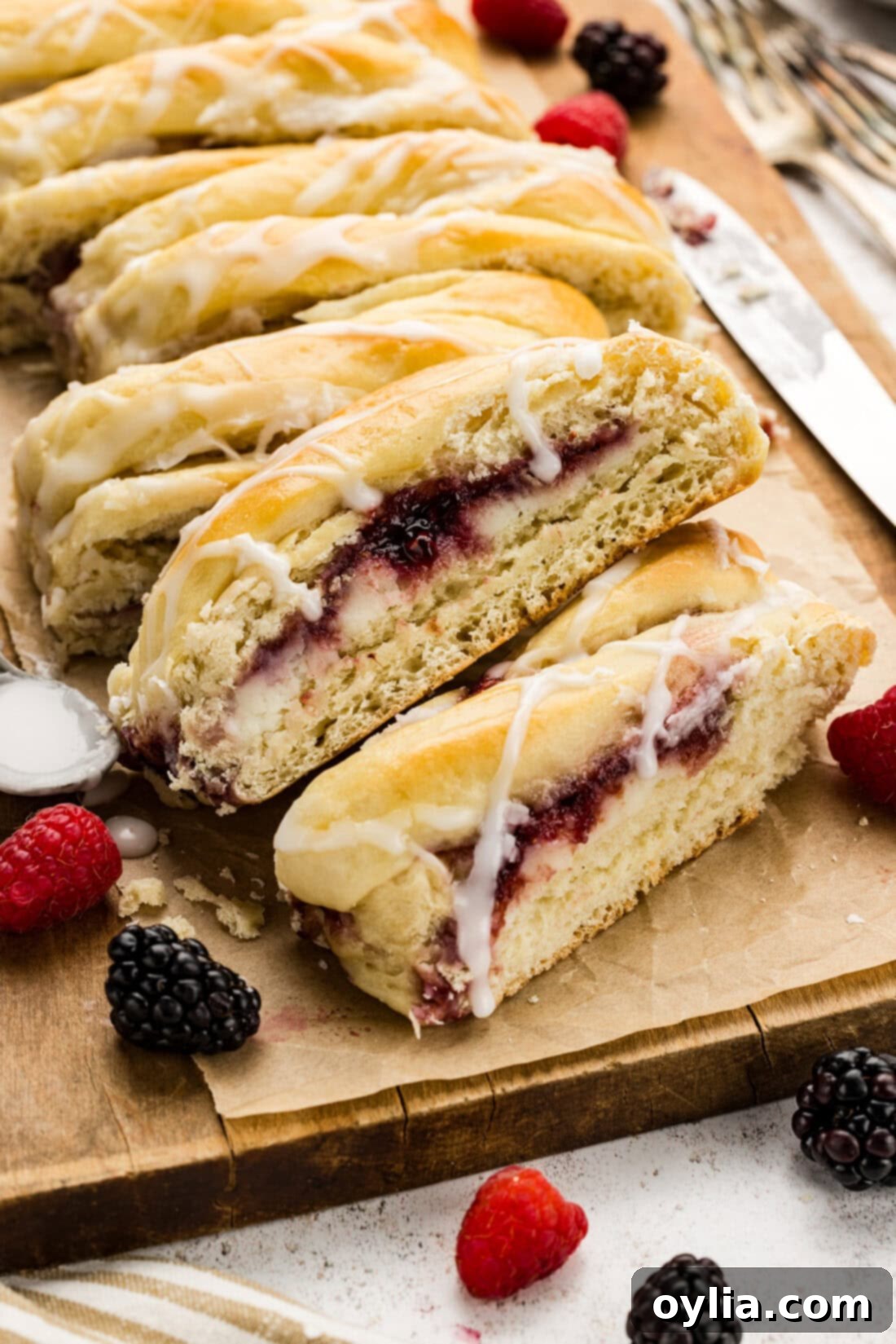 Pile of Braided Breakfast Danish on parchment paper