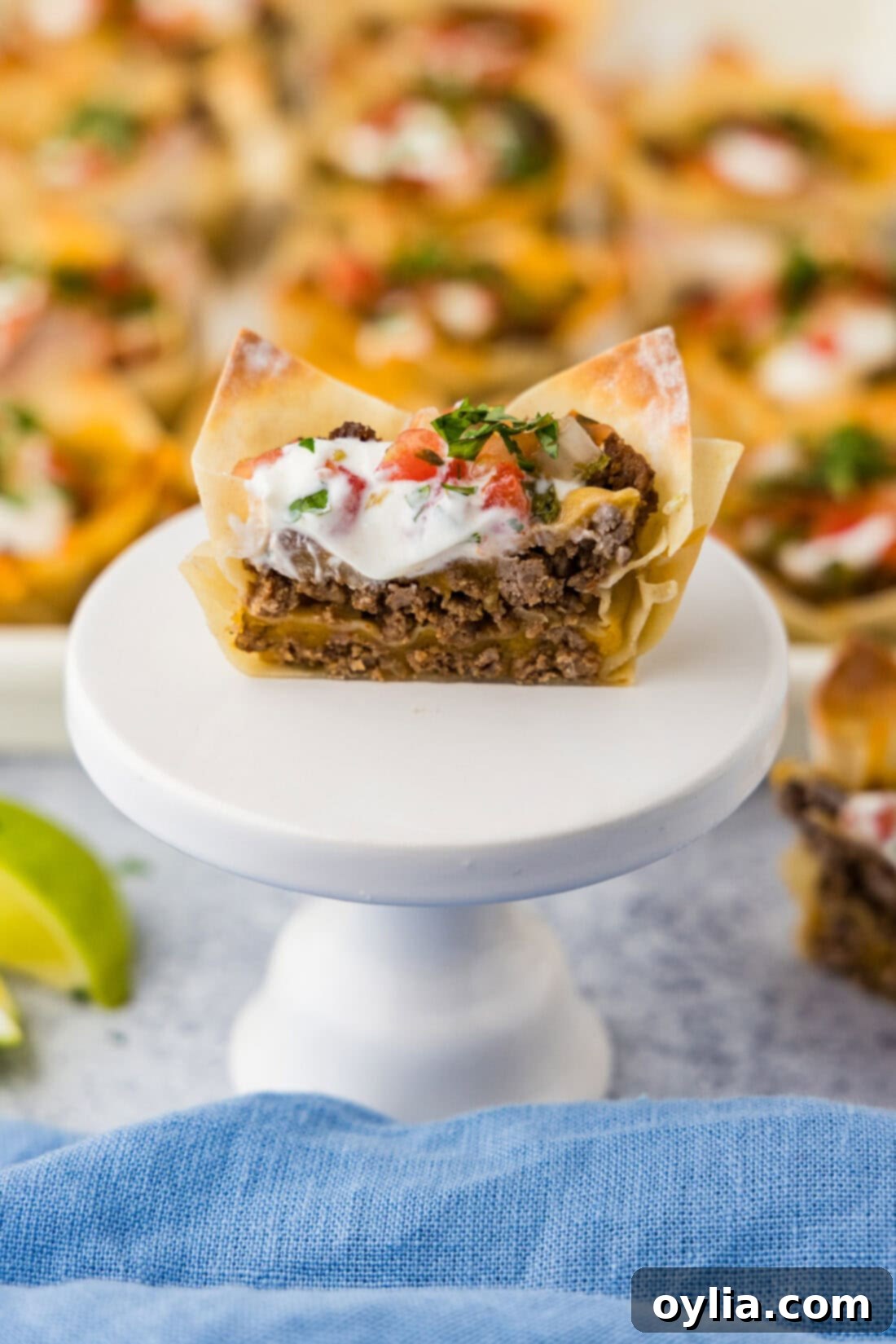 Taco Cup cut in half resting on a cupcake stand