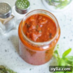 Close up photo of a jar of homemade Marinara Sauce