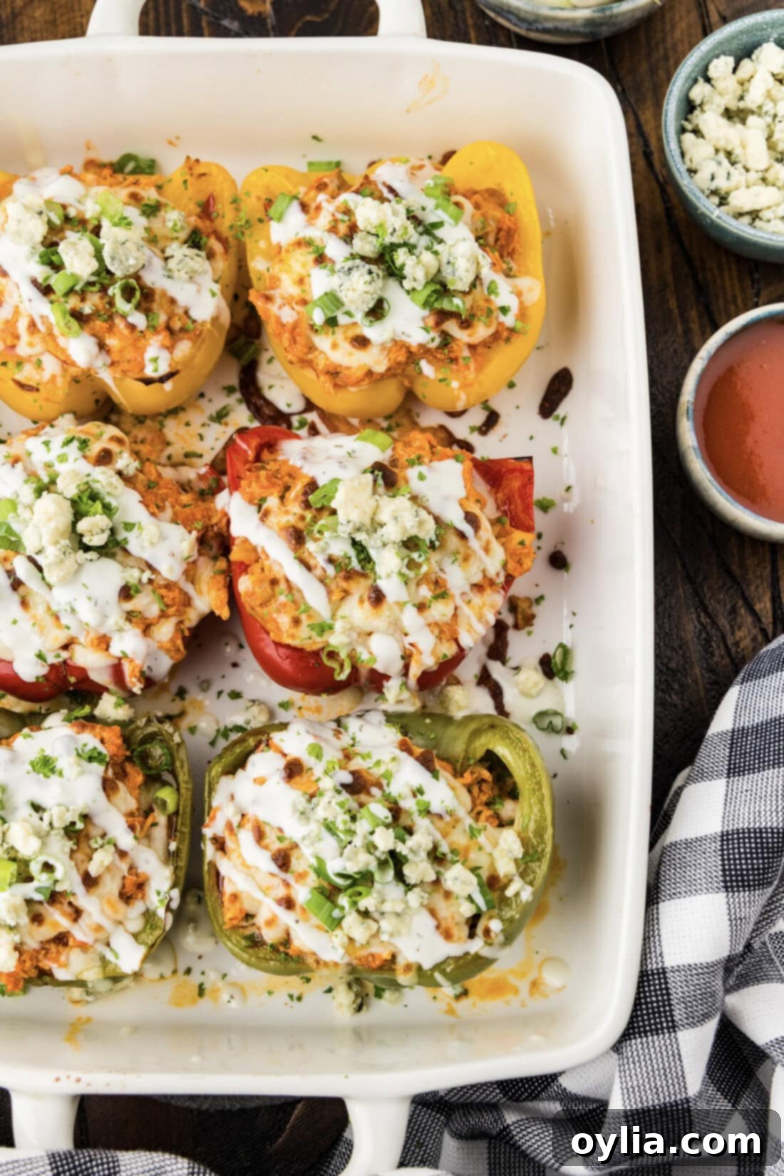 Buffalo Chicken Stuffed Bell Peppers 3 Close up photo of Buffalo Chicken Stuffed Peppers in a baking dish