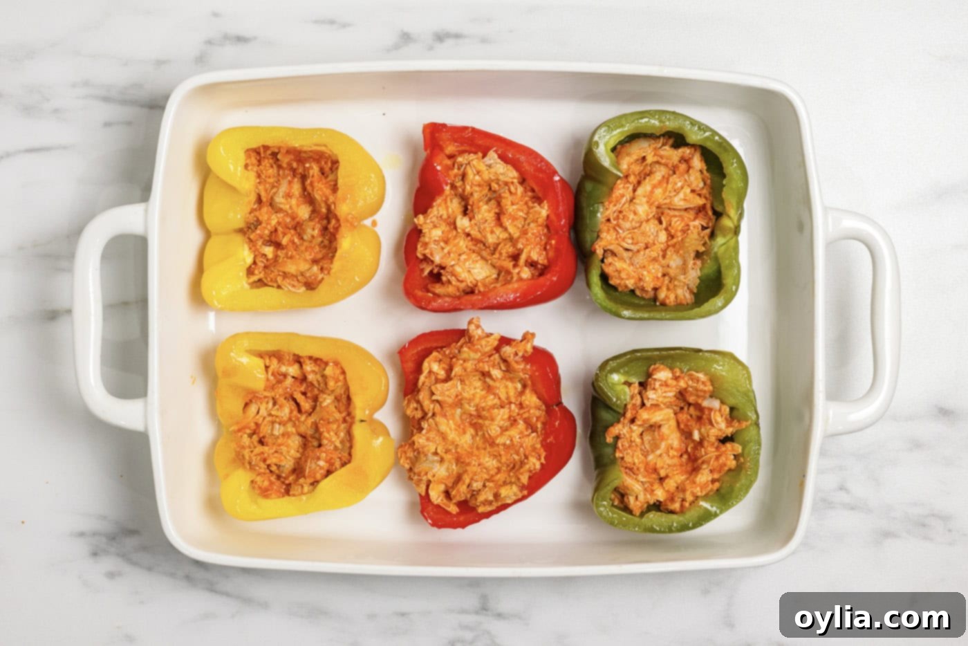 Buffalo Chicken Stuffed Bell Peppers 8 Buffalo chicken mixture stuffed inside bell pepper halves