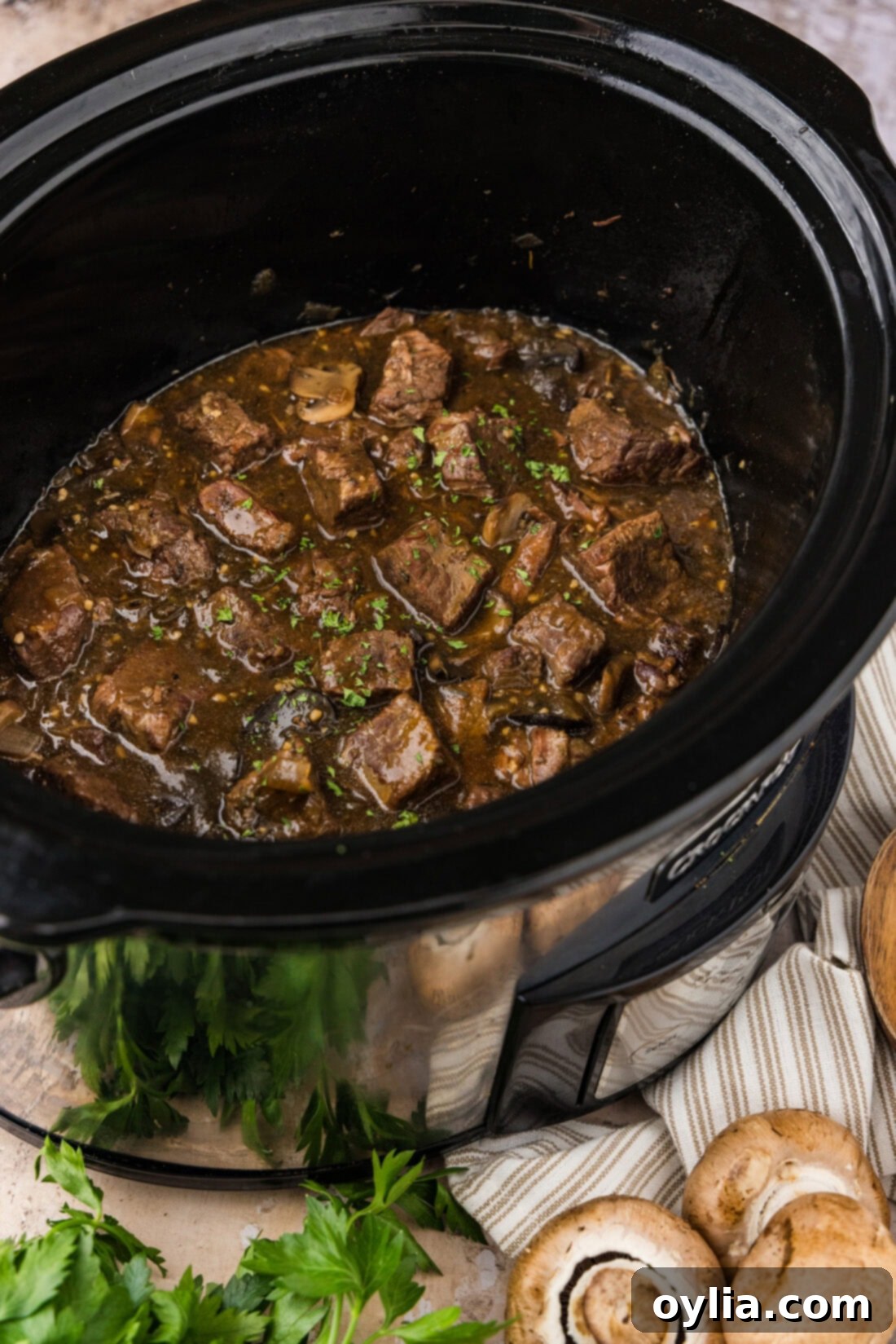 Side photo of Crockpot Beef Tips and Gravy in a Crockpot